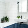 Peckham Home | Blue, black & white bathroom | Interior Designers